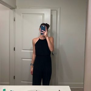 Sleeveless, flowy belted jumpsuit & gold collar